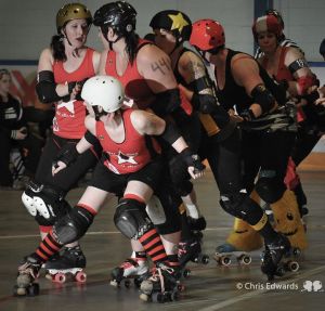Low Key (front) at Flat Track Fever 2014, proving how much she loves blocking - by holding back the entire pack.  Photo by Chris Edwards.